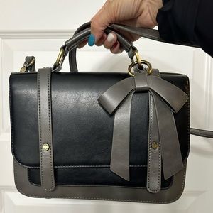 Brand new never used bow faux leather crossbody bag